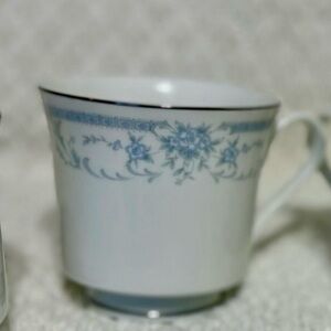 Elegant Blue Floral Teacup